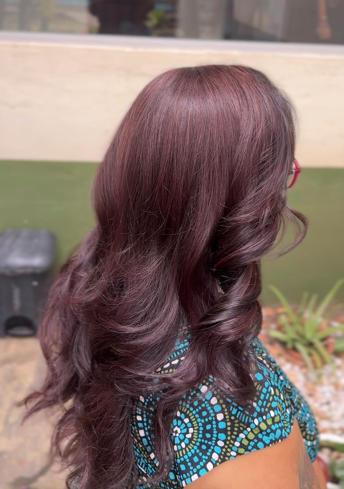 Plum burgundy colour on wavy fine hair